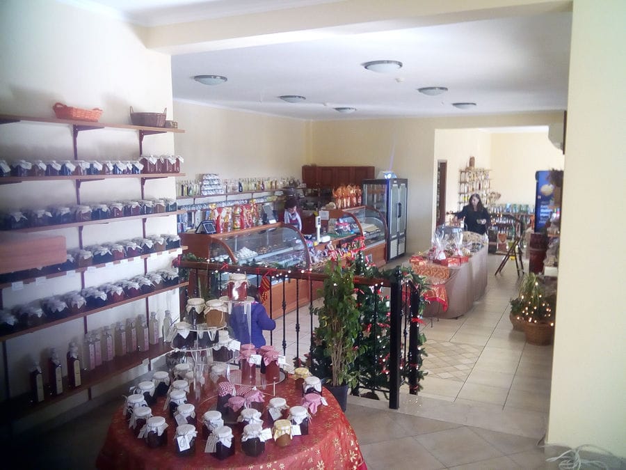 'Agrotouristic Women's Cooperative of Mesotopos Lesvos' store inside with jars and food products on shelves
