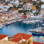 a harbor with many boats and buildings