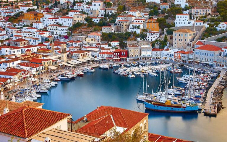 a harbor with many boats and buildings