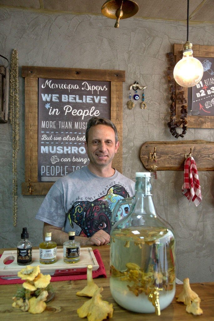 Eleutherios Lahouvaris smiling at the camera and owner of 'DIRFIS MUSHROOMS'