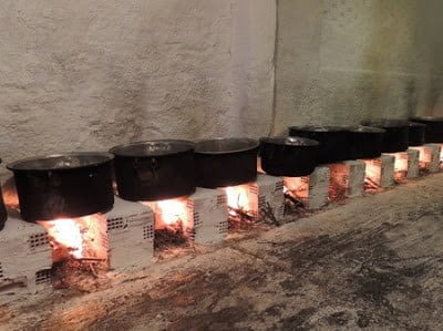 bronze cauldrons with food on the fire at Oxilithos Festival, Euboea, Greece