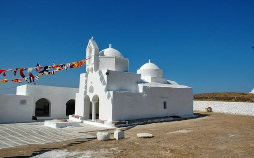 front of the entrance of the Church of the Holy Virgin of Nikous and commemorate festival of her birth at Kythnos, Messaria, Greece