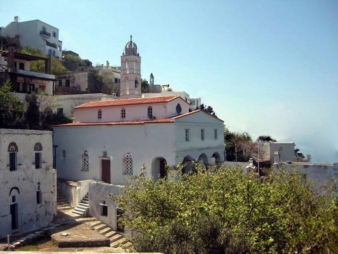 far view of front of church of St. John the Baptist, at Tinos, Mountados that commemorate festival of her birth