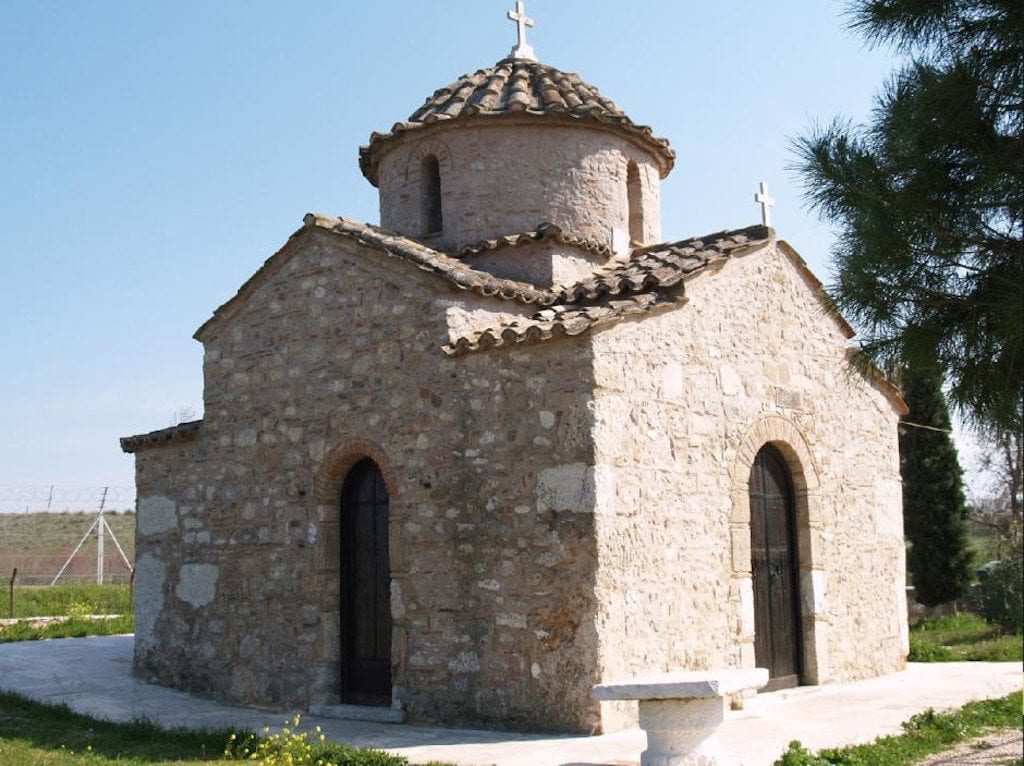 front of the stone church of the Apostles Peter and Paul at Attica, Spata, Greece that commemorate festival of her birth 