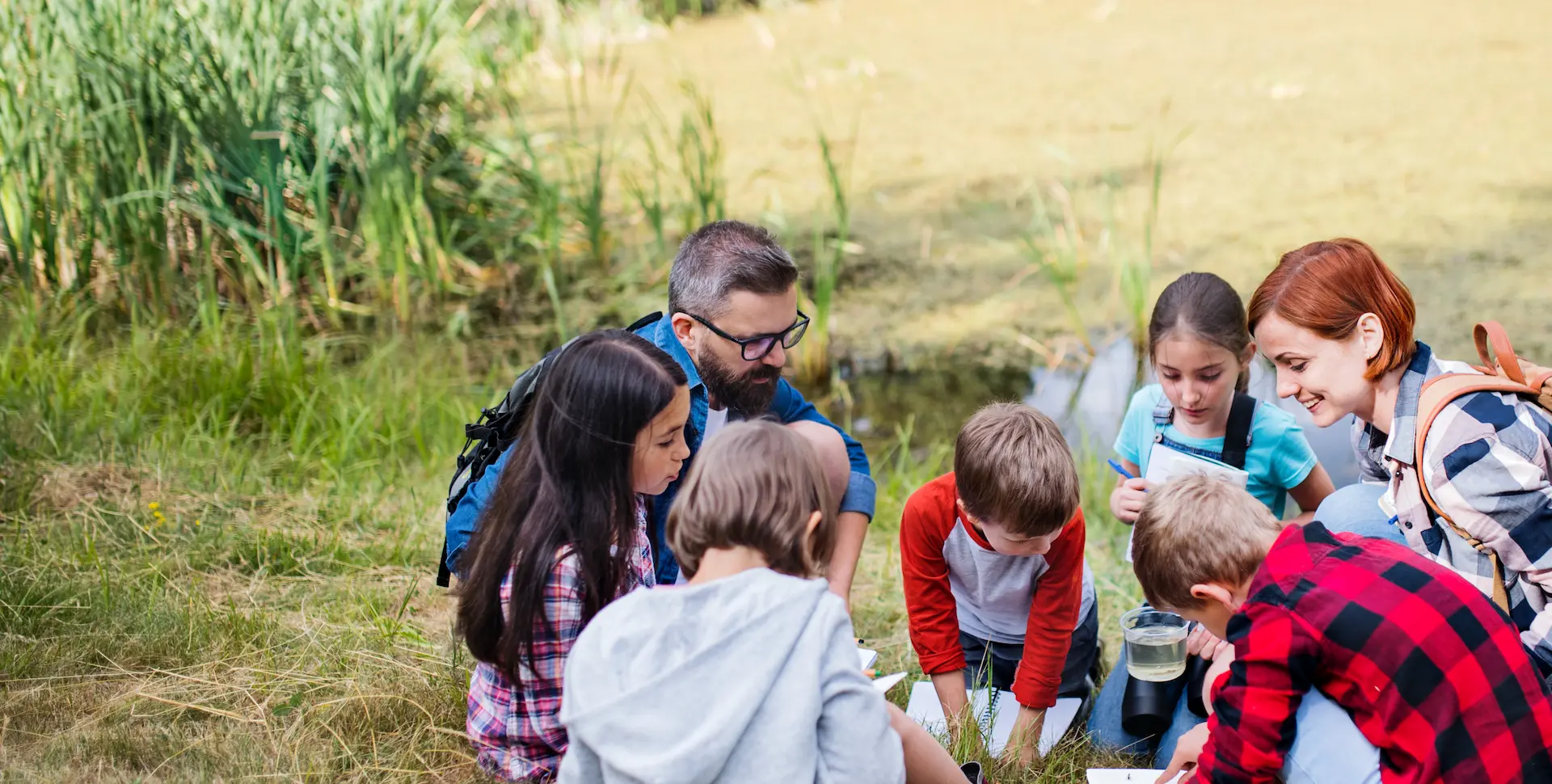 group-of-school-children-with-teacher-on-