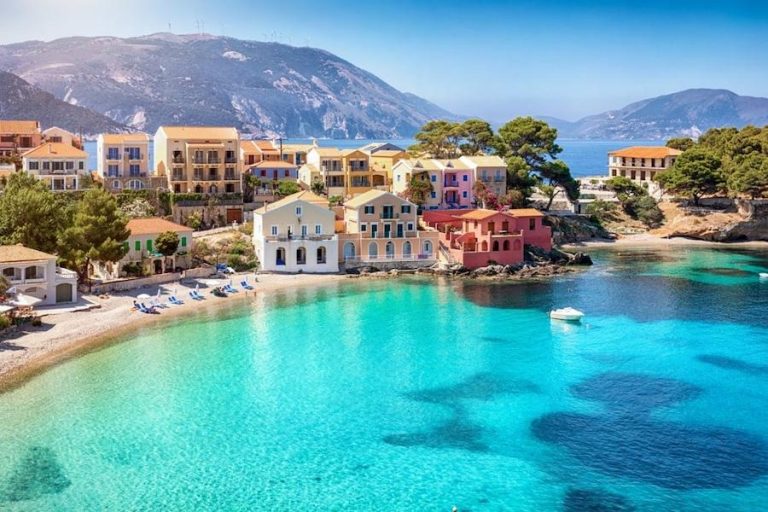 seaport at Kefalonia, Greece, with buildings in the background of the sea