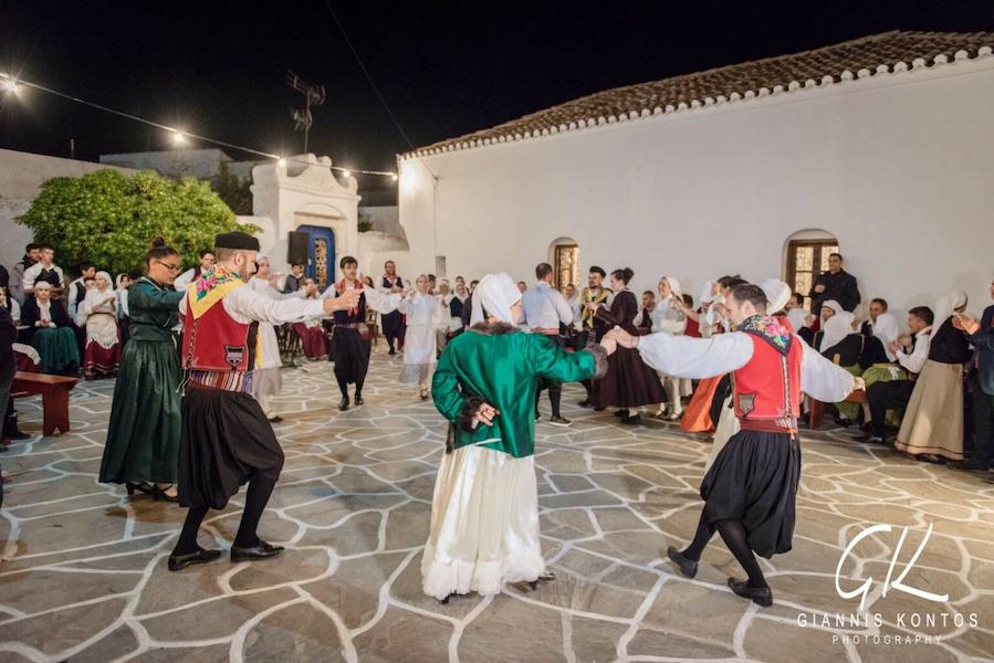 people dancing in circle at the custom of Kythnos island Greece