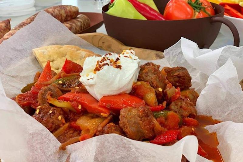 Spentsofai made with fried peppers, tomatoes, spices and the traditional Volos sausage