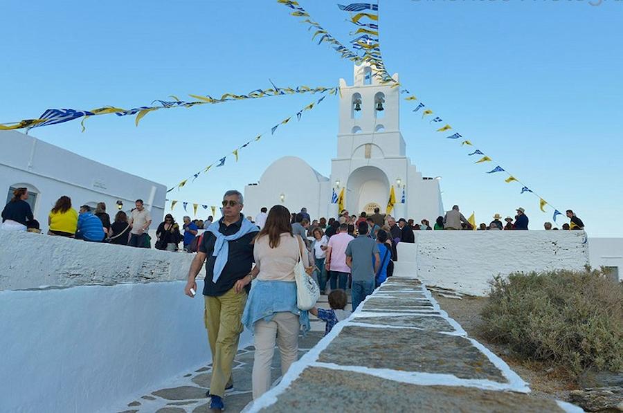 people walking front the church of of Panagia of Chrisopigi - Gastronomy Tours