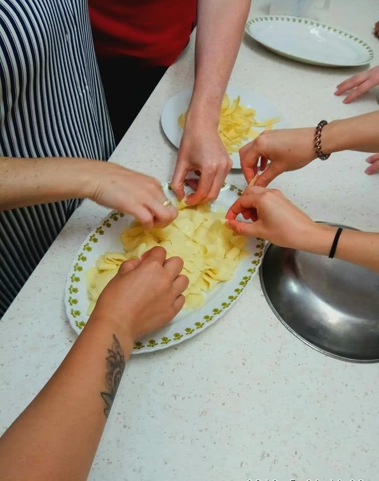 close-up of children eating hilopites pasta at Thracian Pasta workshop