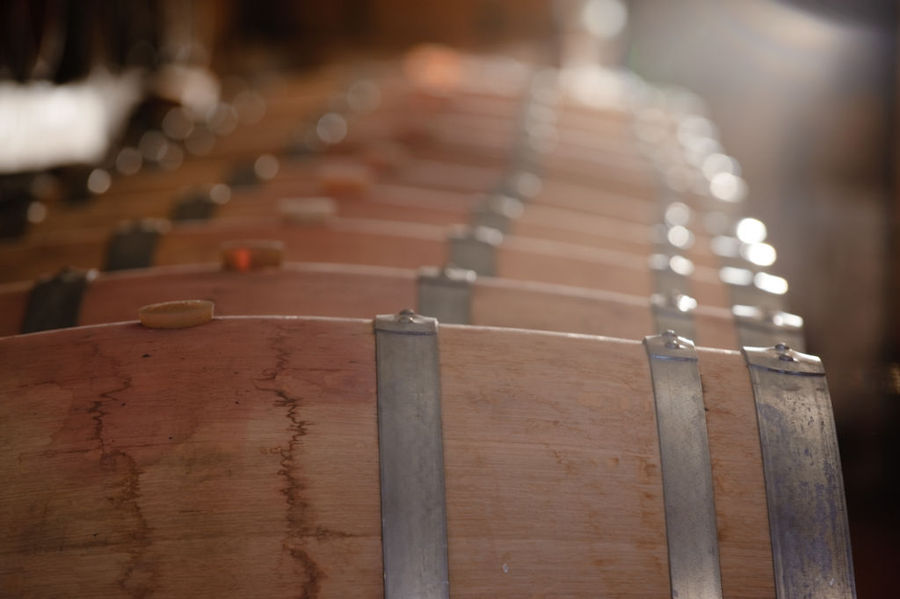 lying wine wooden barrels in 'Tsililis' cellar