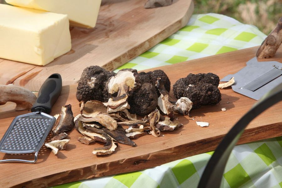 truffles and grated truffles and a rodent on wooden boards at 'Mushroom Museum Meteora'