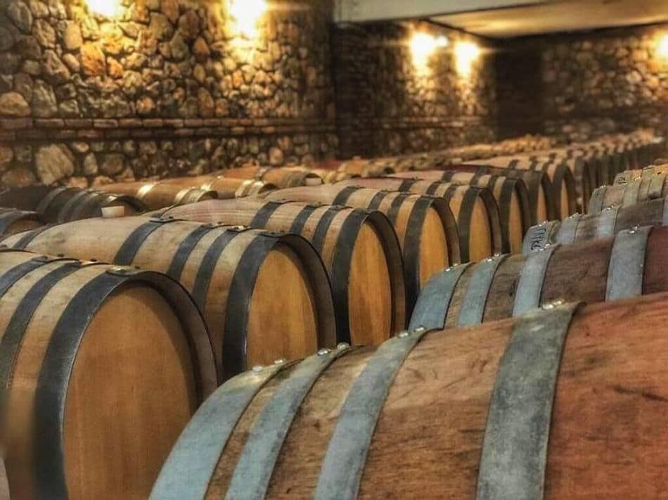 wooden barrels at ‘Chateau Kaniaris’ cellar that recognized with many awards|