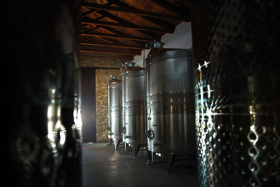 aluminum tanks in production process at Chateau Kaniaris winery premises