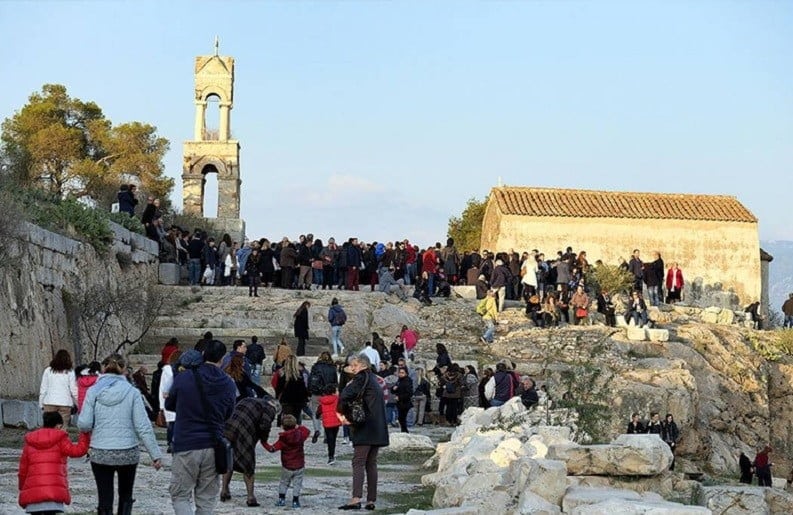 church Holy Virgin of Mesosporitissa at Eleusis with peoples surrounded