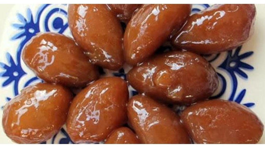 Close-up of Greek ‘Finikia’ are brown spherical cookies covered with honey