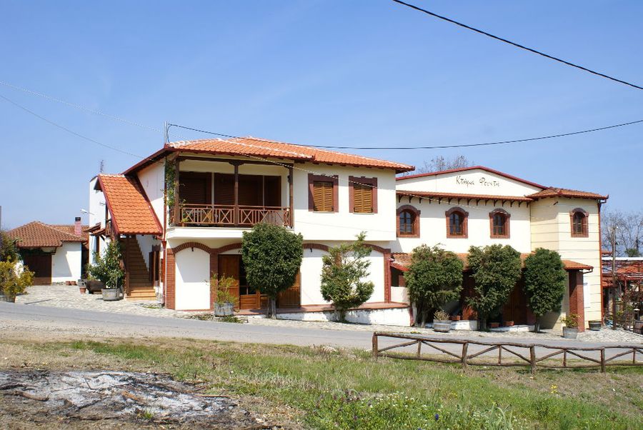 view of 'Foundi Estate' with pavement and green lawn in the front