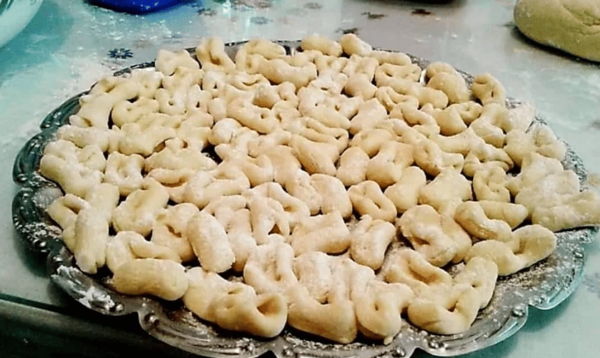 Close-up of plateau with uncooked Greek ‘Kourkoubines’ is a fresh pasta like tortellini