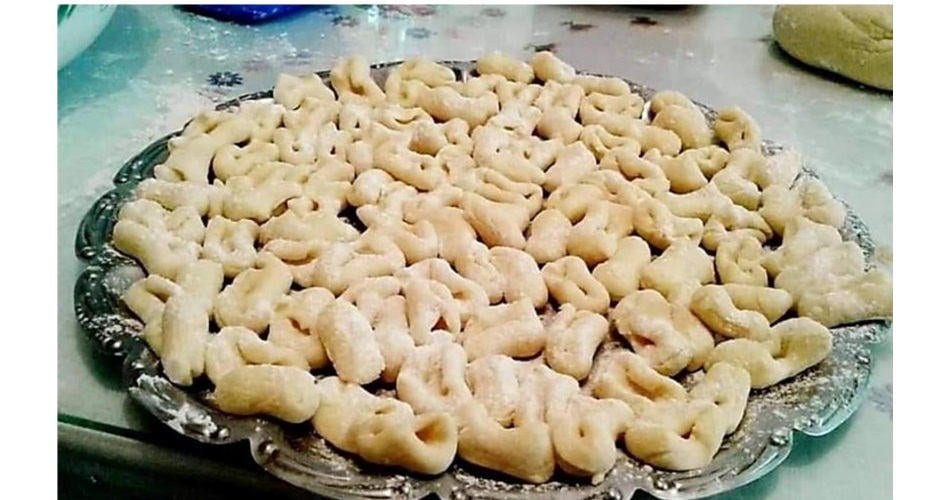 Close-up of plateau with uncooked Greek ‘Goglies’ is a fresh pasta like tortellini