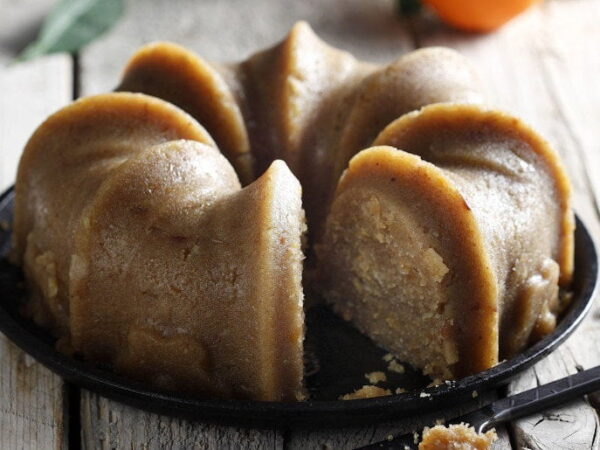 Close-up of spherical Greek ‘Halva simigdalenio’ means pan-baked sweet covered with syrup from semolina