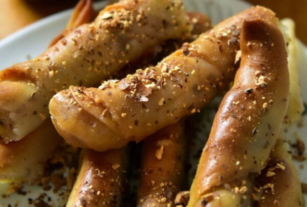 close-up of Greek ‘Katimeria’ are fried pretzels of dough stuffed with fresh cheese
