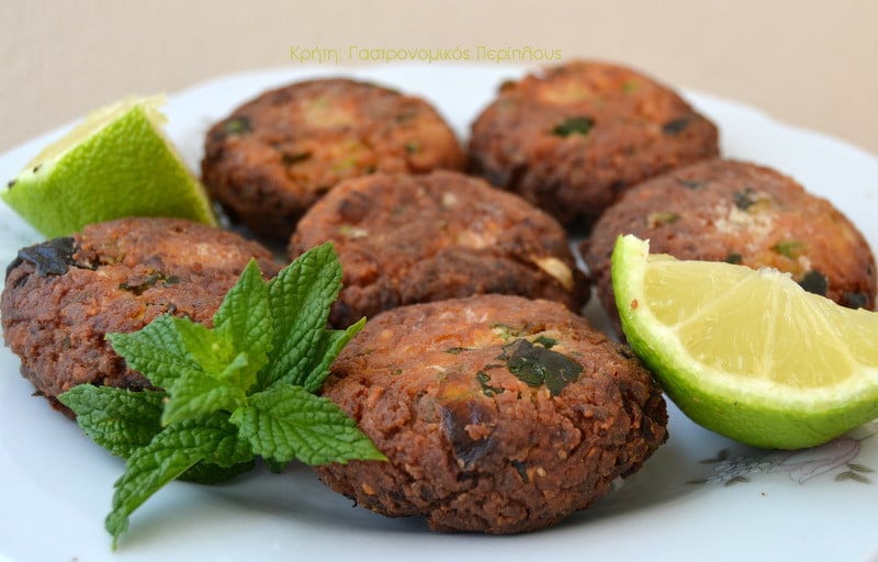 close-up of plate with ‘Kolokythokeftedes’ are fried meatballs made from green zucchini and herbs