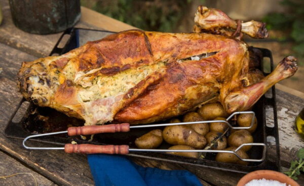 Close-up of Greek ‘Lambriano’ food means lamb stuffed with rice and cooked in the oven
