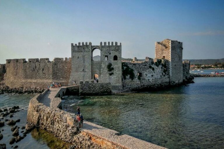 view of seaport of Messenis with old towers and the sea