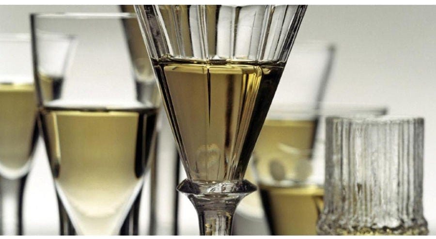 Glasses of champagne with Greek ‘pontzi’