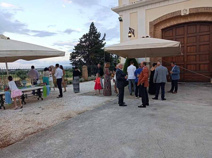 Some people discussed outside of the Gikas winery entrance