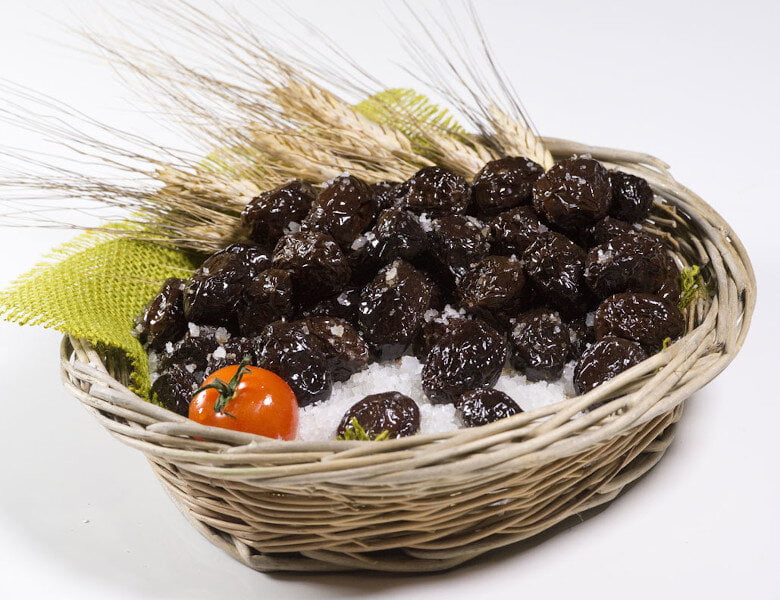 wicker basket with ‘Throumba’ olives are wrinkled