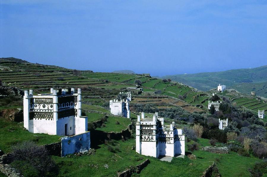 view of Tinos island pigeon houses and blue sky in the background