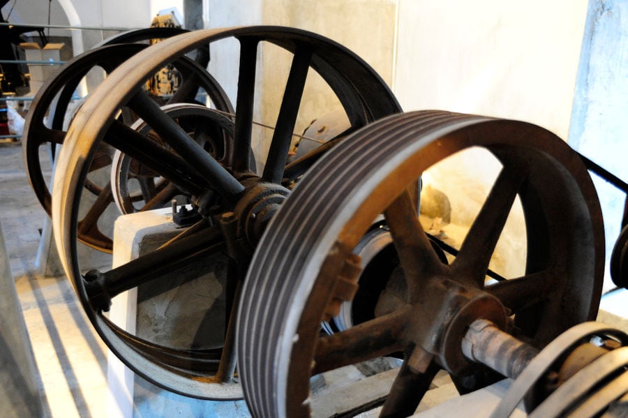 close-up of old iron wheels at 'Tomato Industrial Museum'