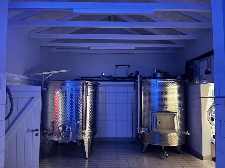 Two aluminum wine storage tanks at Jima winery plant