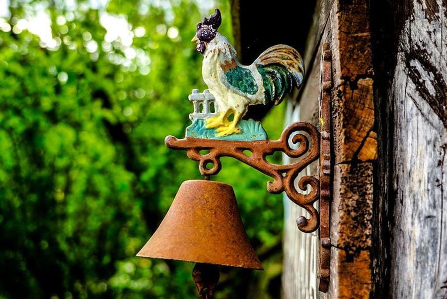 ceramic cock with bell to Amfikaia entrance