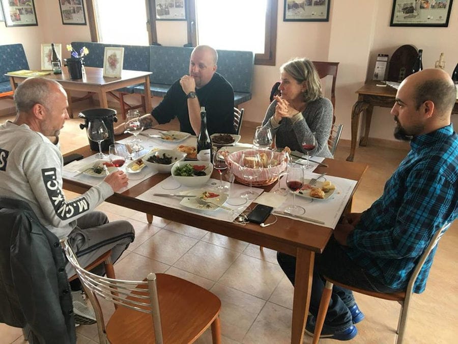 tourists tasting wines and eating at 'Argatia Winery'
