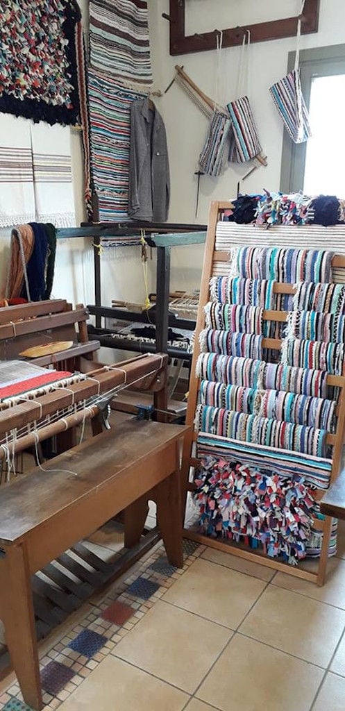 traditional looms and handmade colourful carpets at Aristaios' folklore museum