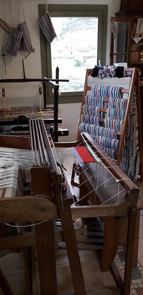 traditional looms and handmade colourful carpets at Aristaios' folklore museum