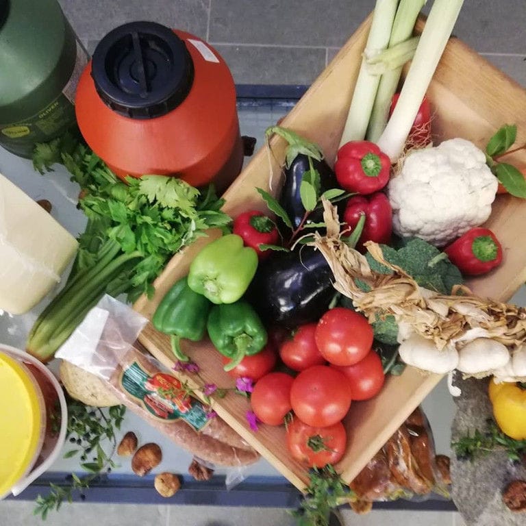 view from above of legumes in wooden keeper, plastic jar from Ben Olive Mill