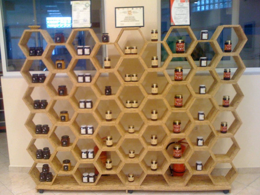jars with honey on the wooden shelves at Corfu Beekeeping Vasilakis store