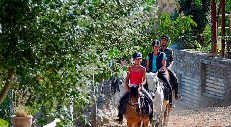 tourists doing horseback riding at Country Hotel Velani's complex