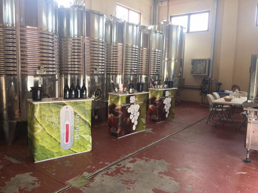 lying aluminum wine storage tanks at 'Diamantakis Winery' plant