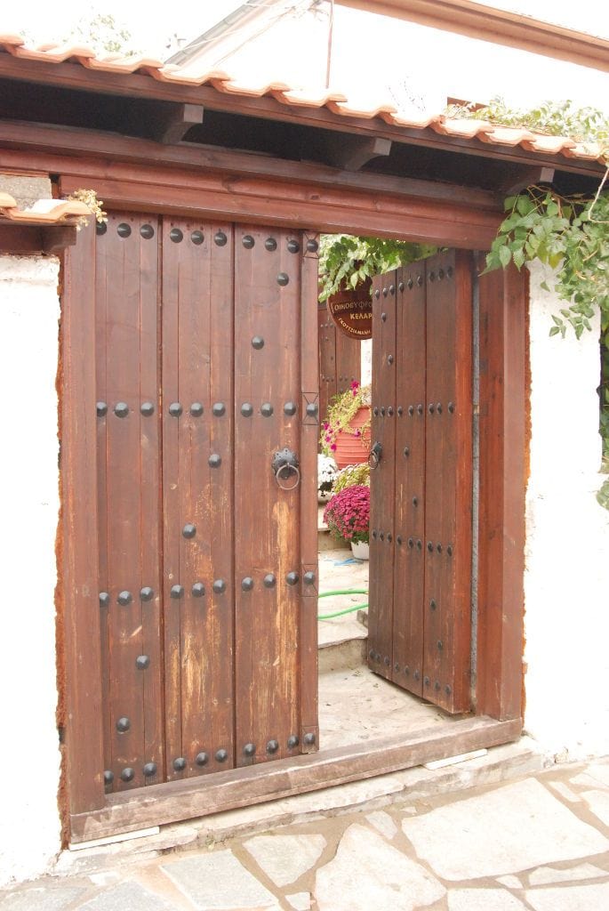 'Dio Fili' winery entrance with wood doors