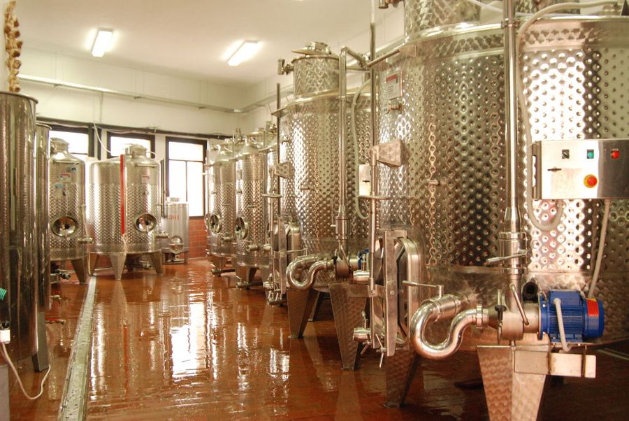 lying aluminum wine storage tanks at 'Dio Fili' plant