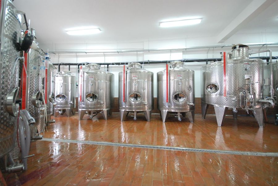 lying aluminum wine storage tanks at 'Dio Fili' plant