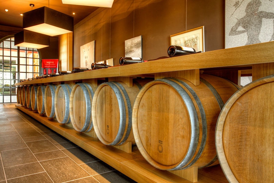 table from wine wood barrels at 'Domaine Skouras' facilities