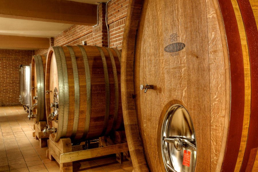 wine wooden barrels into 'Domaine Skouras' cellar