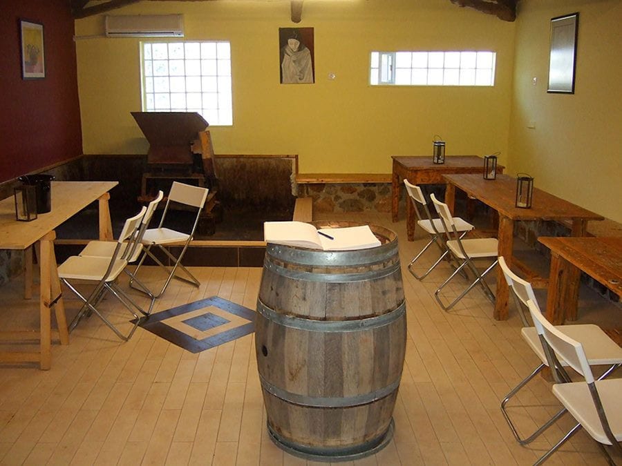 book on the wooden desk in a tasting room at 'Domaine Anagennisi' winery