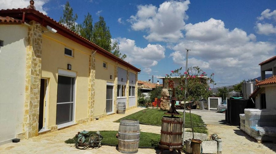 old grape press front the 'Domaine Anagennisi' winery