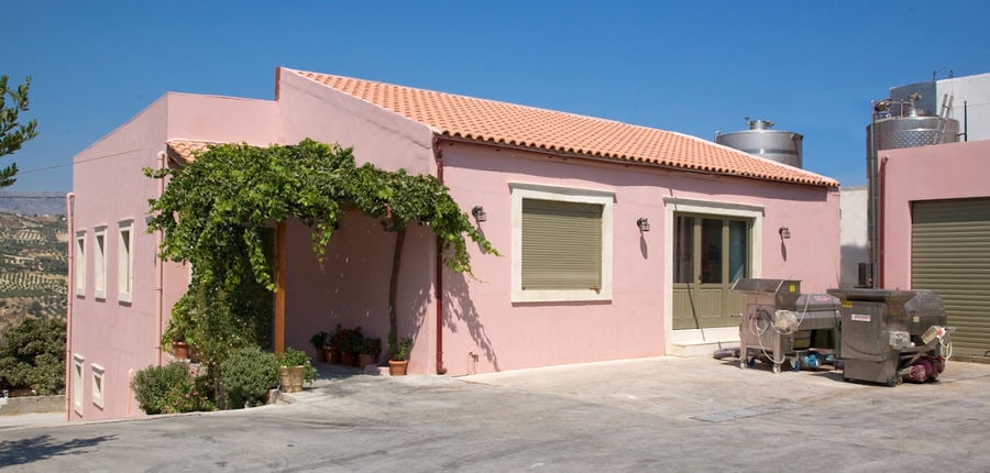 Douloufakis Winery building front view with pink walls